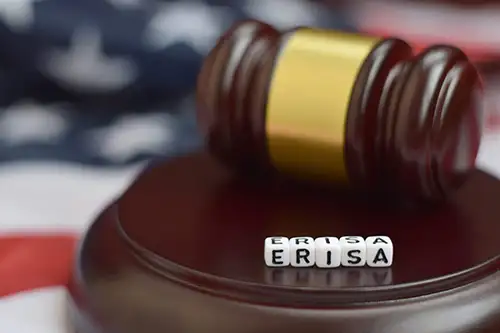 gavel with the words Erisa spelled out in blocks